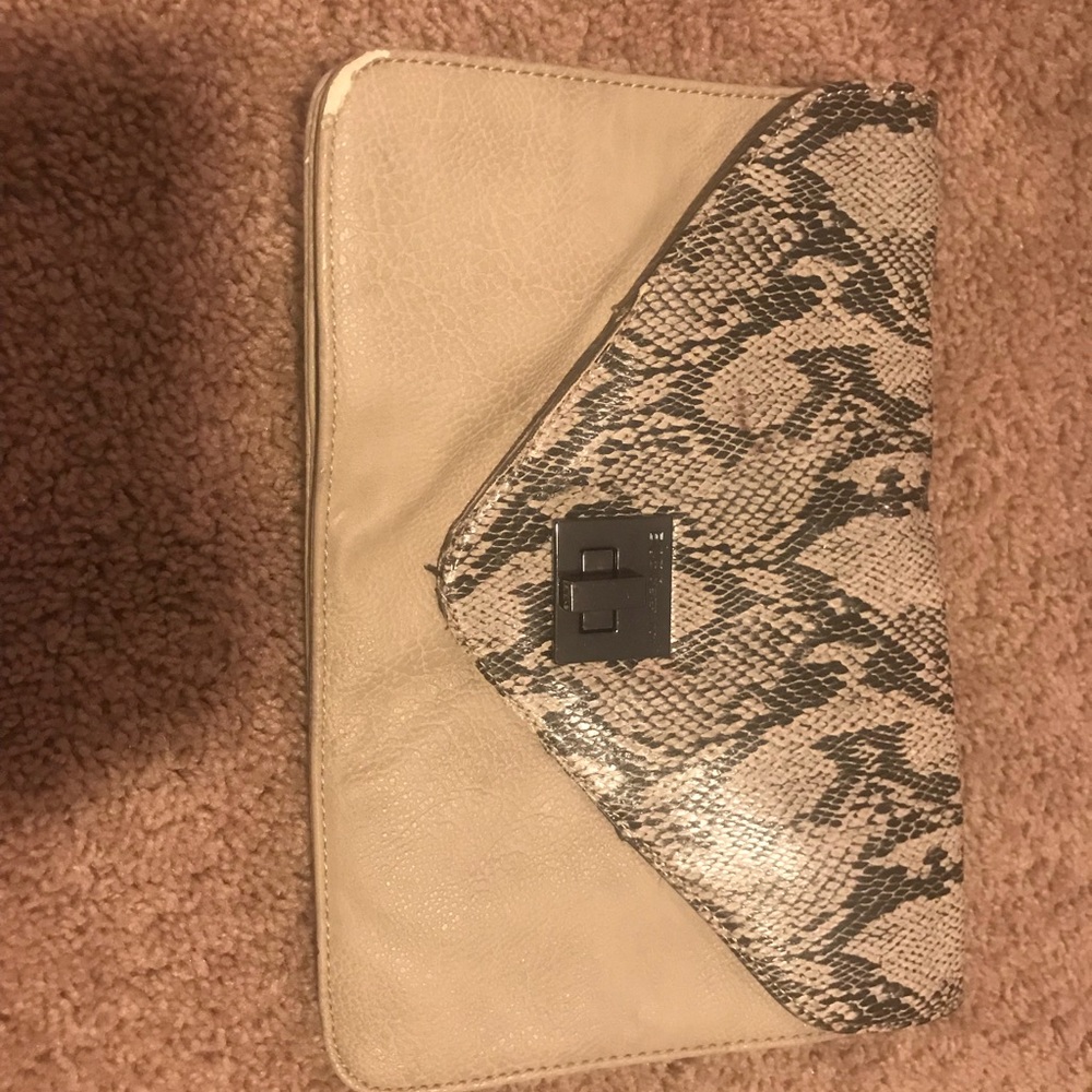 Leather and snake skin clutch